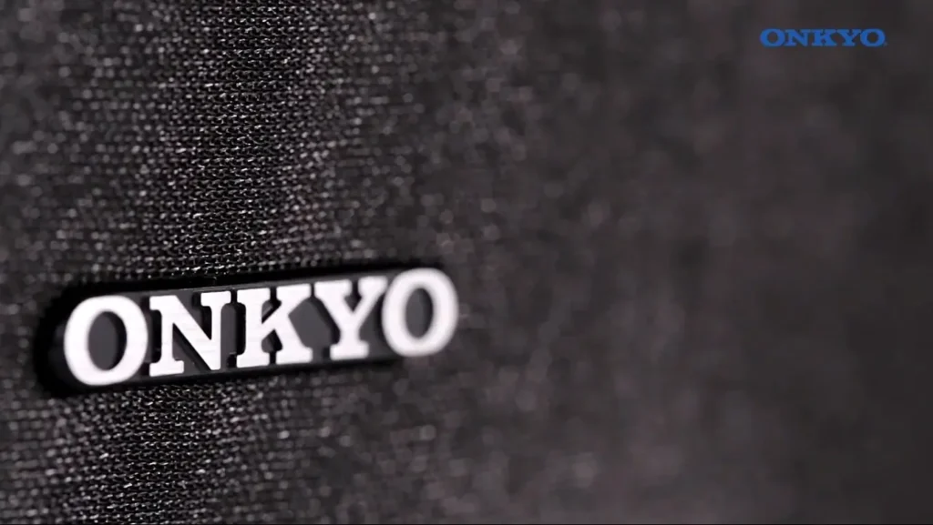 A closer look of onkyo ht-s7805 logo of onkyo on speaker grill